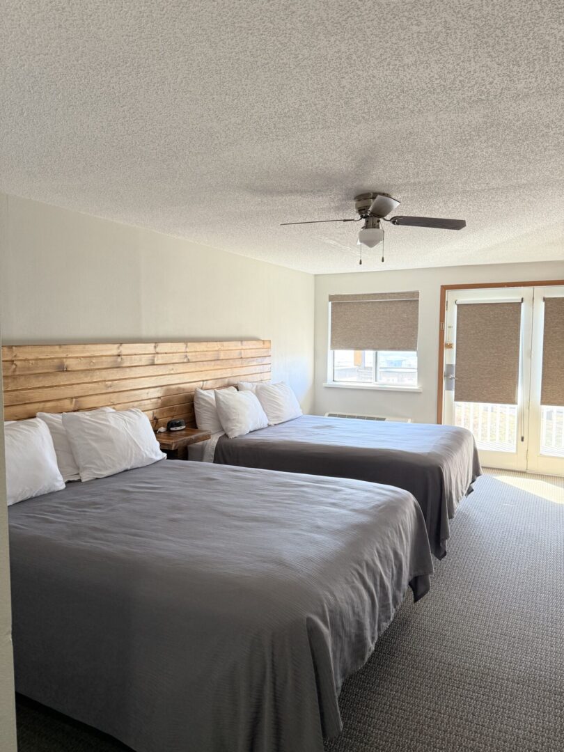 Hotel room with two double beds.