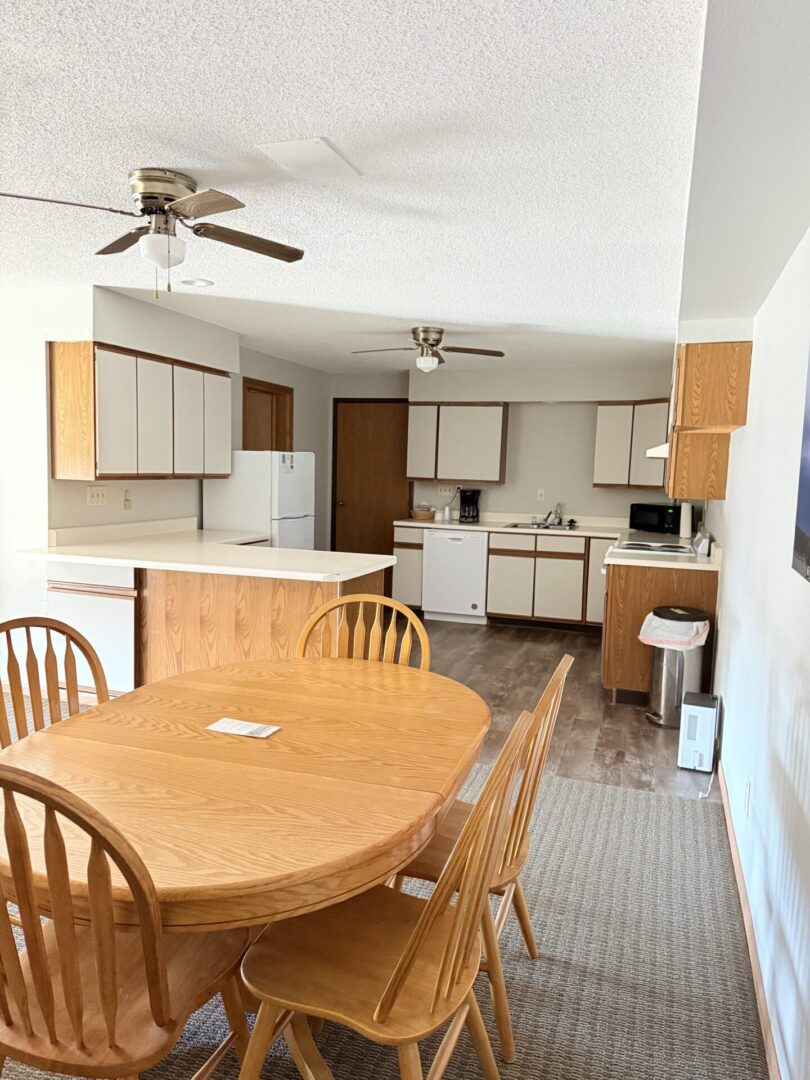 Kitchen with dining table and chairs.